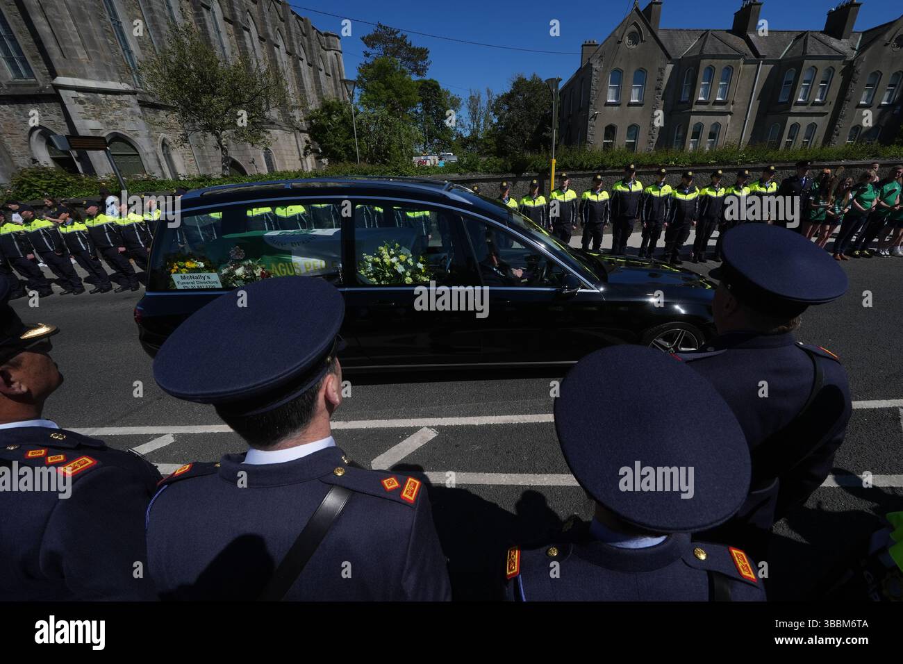 Garda colleagues and members of the DMR Roads Policing unit, form a ...