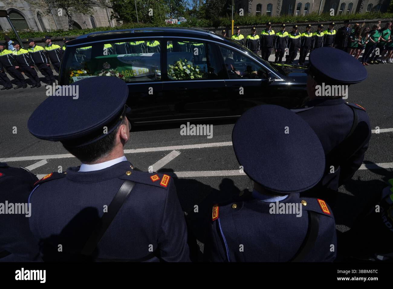 Garda colleagues and members of the DMR Roads Policing unit, form a ...
