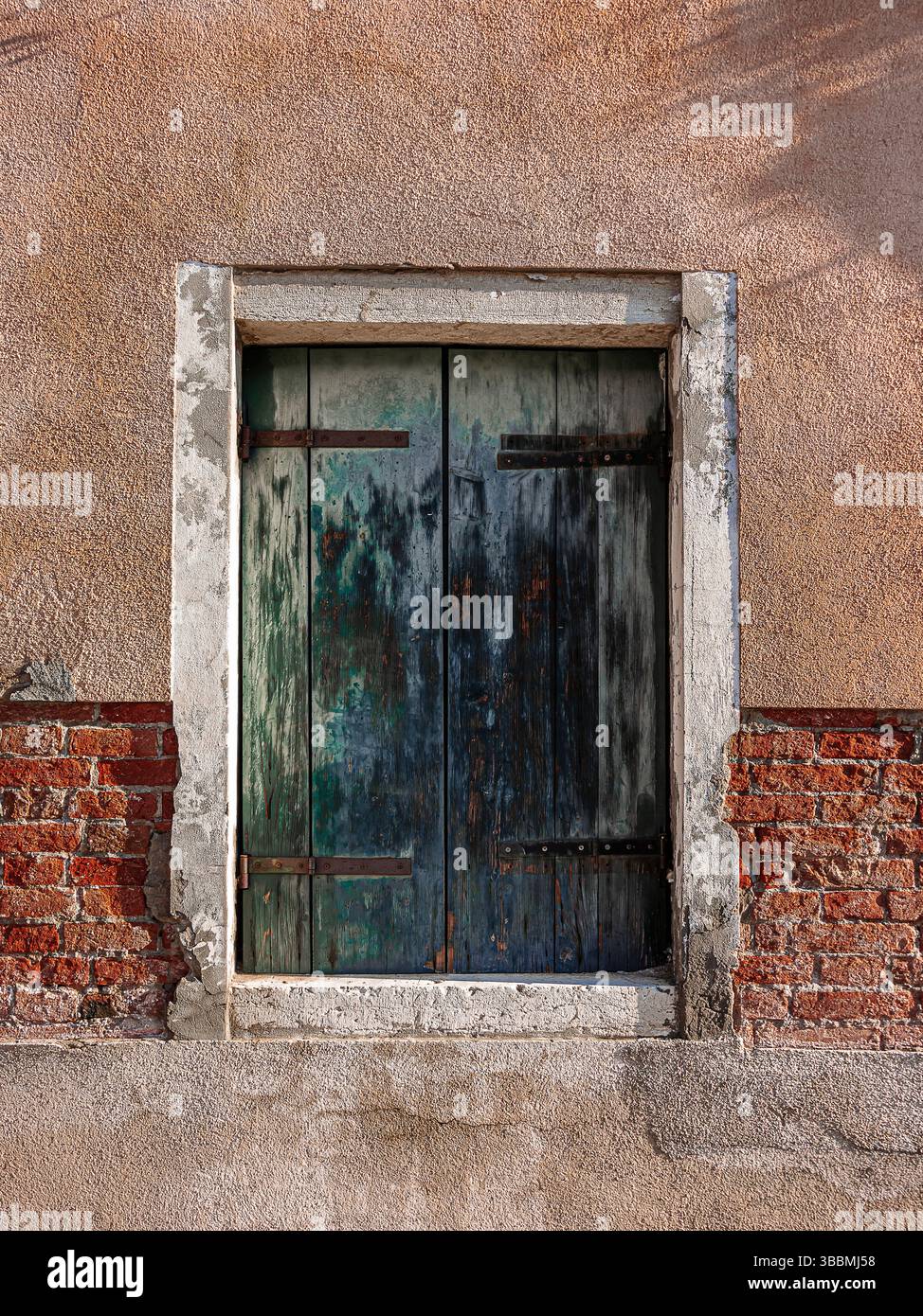 a rustic window of a Murano house Stock Photo