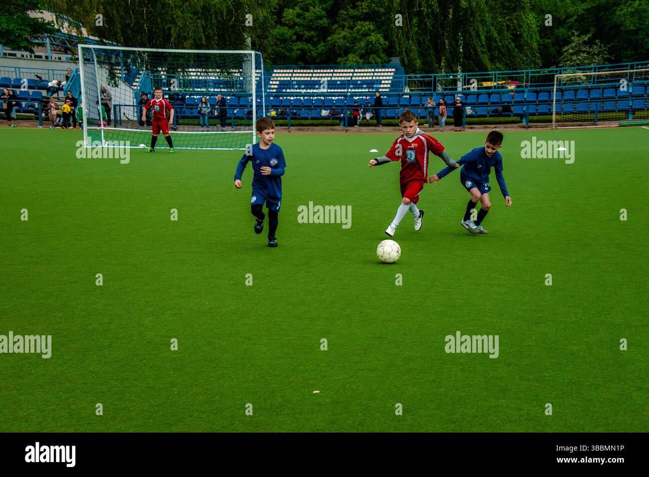 Soccer, ball or sports and a team training or playing together on a field for practice. Stock Photo