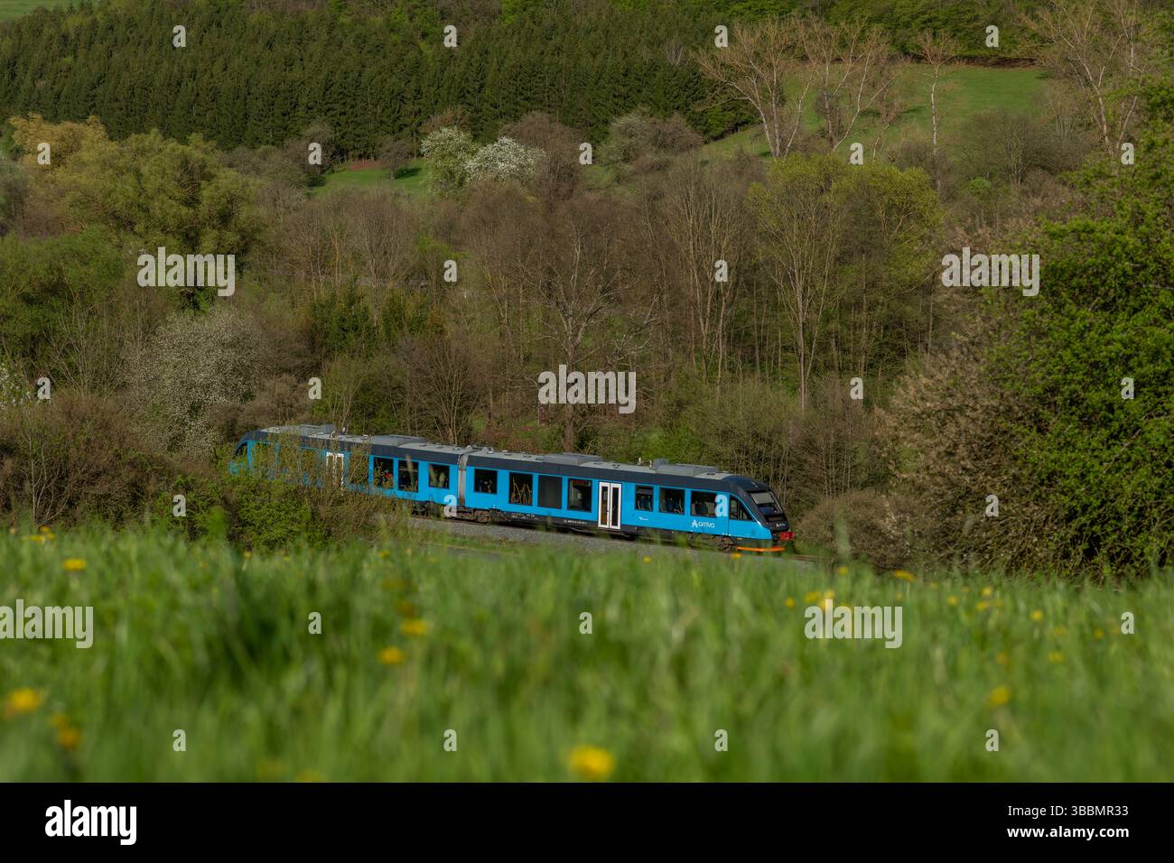 Passenger trains in spring fresh color day near Luhacovice CZ 04 19 2025 Stock Photo