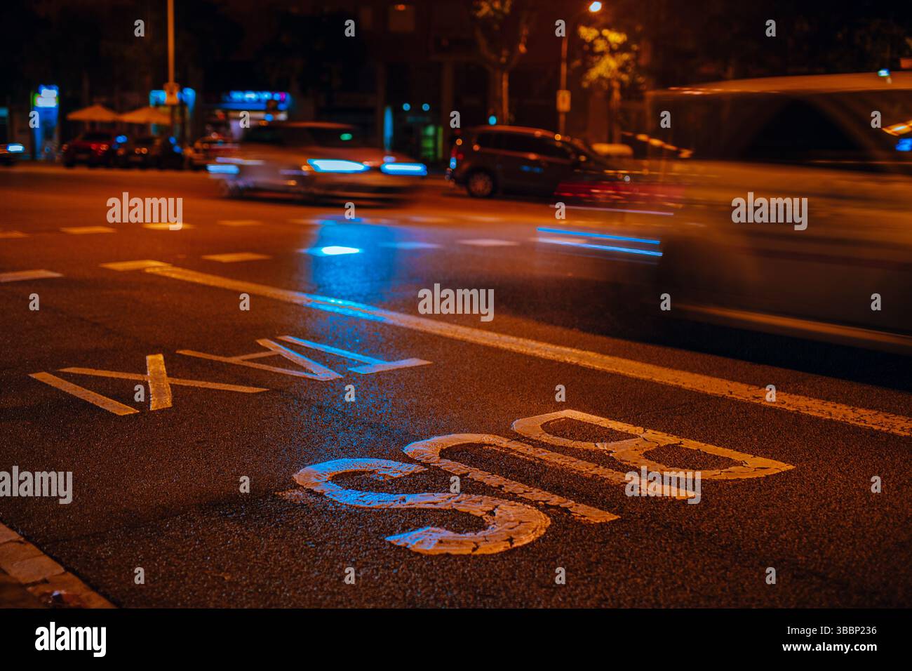 Cars on city road at night, blurred motion Stock Photo - Alamy