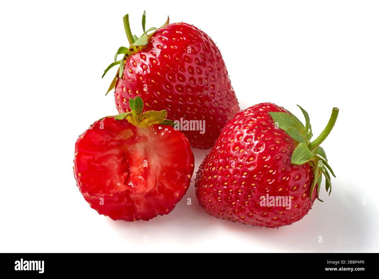 three ripe sweet strawberries isolated on white background Stock Photo ...