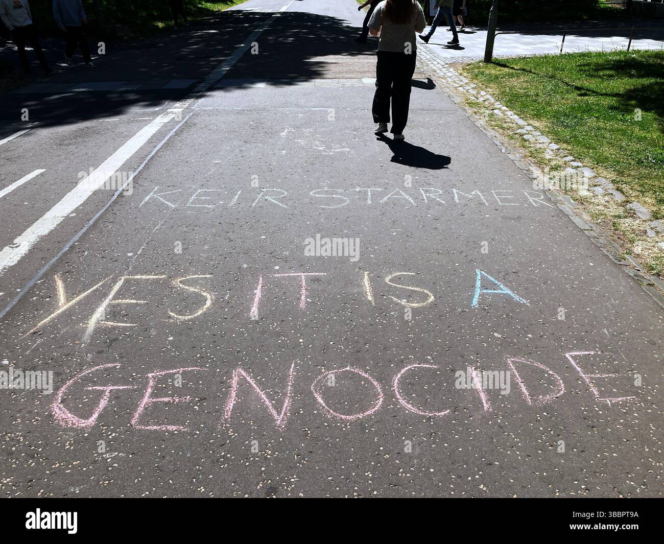 Anti Israel - Pro Palestine, Keir Starmer Yes it is a Genocide, chalk drawing grafitti on pavement, Edinburgh Scotland, UK - Smartphone Captured Stock Image