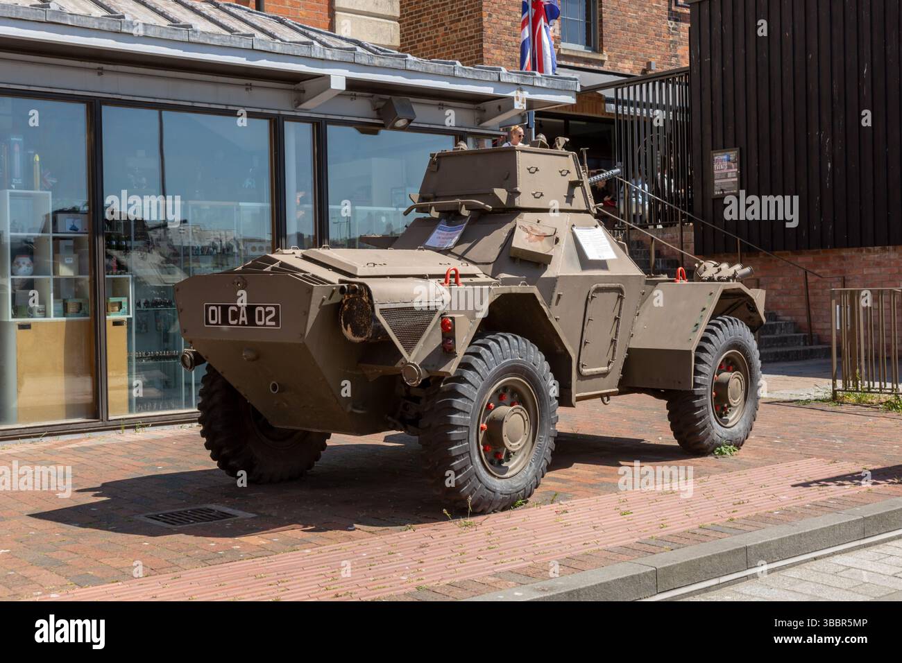 Soldiers of Gloucestershire museum with an armoured car outside, Gloucester, UK Stock Photo
