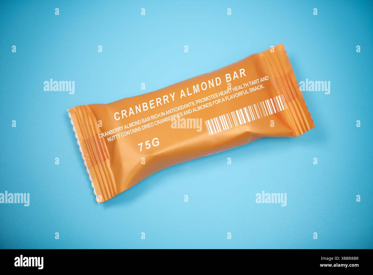 Cranberry almond bar. Rich in antioxidants, promotes heart health. Contains dried cranberries and almonds for a flavourful snack. Stock Photo