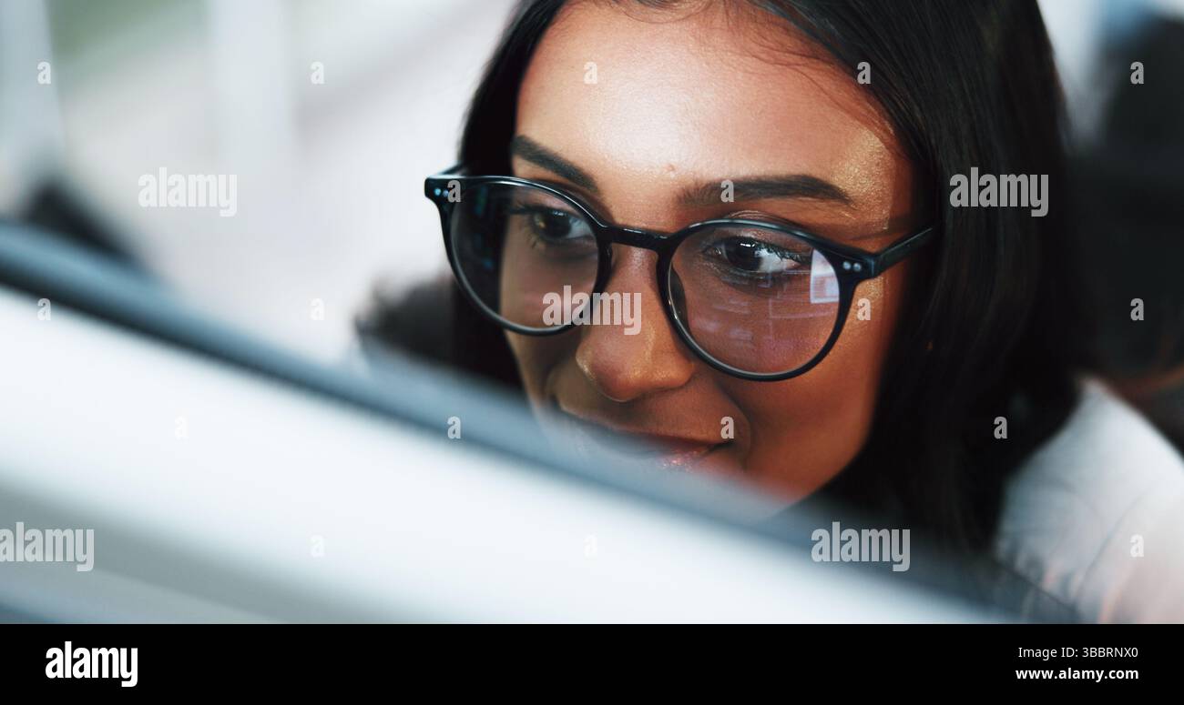 Woman, programmer or coding with glasses on computer for software development or web design at office. Female person, coder or developer with Stock Photo