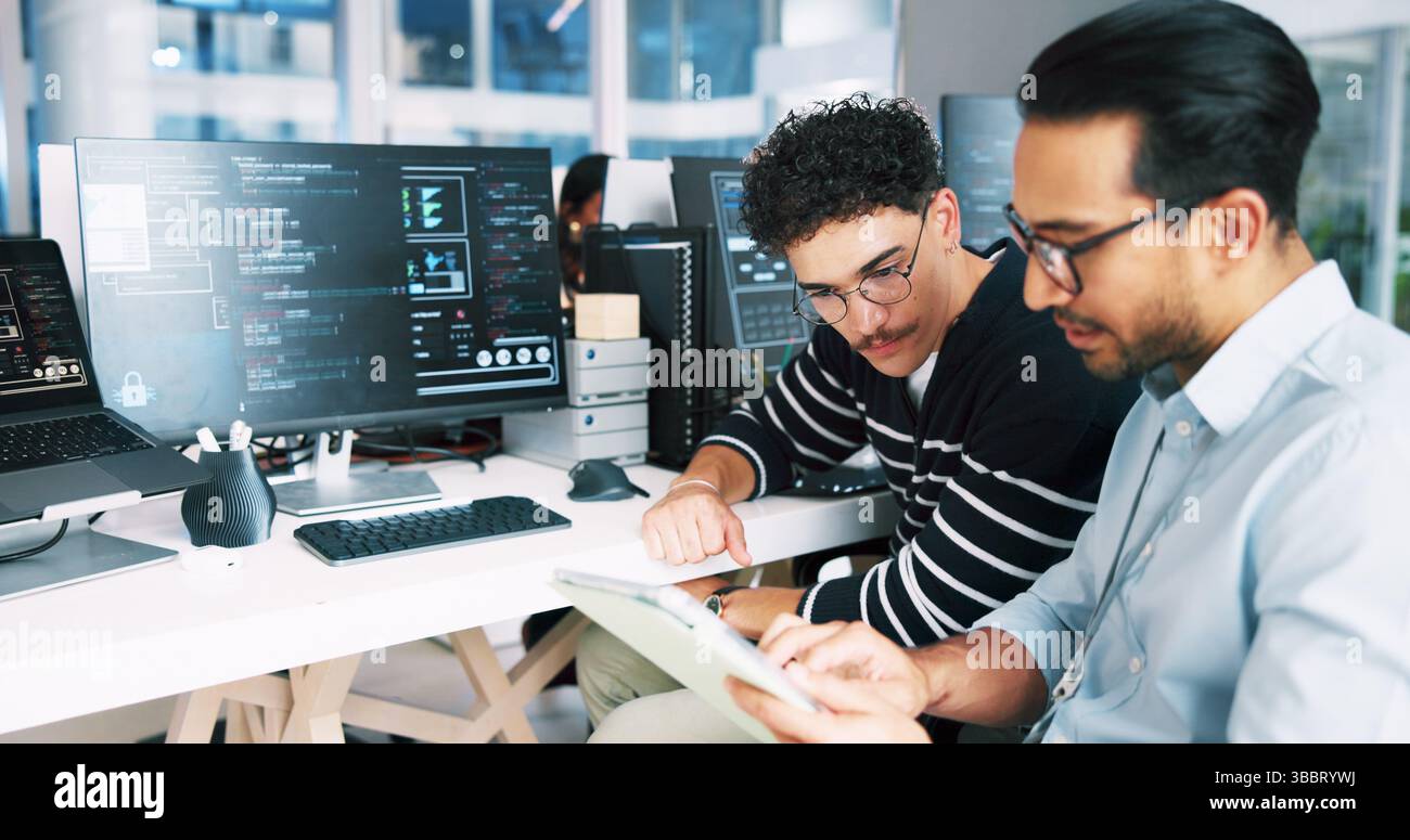 Web developer, tablet and coding in office for software, system or website update advice. Night, programmer and backend engineer with feedback for Stock Photo