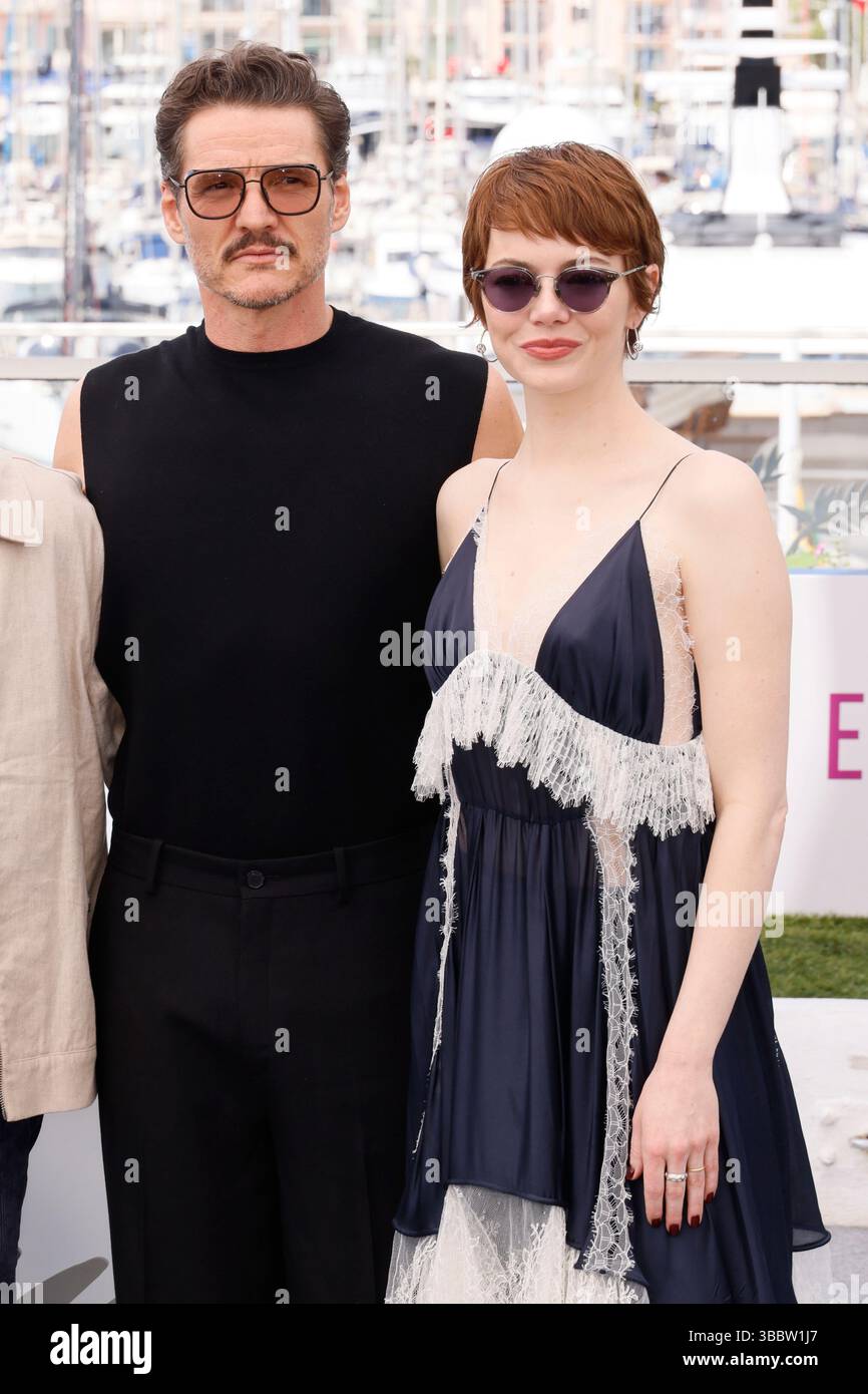 Pedro Pascal, left, and Emma Stone pose for photographers at the photo ...