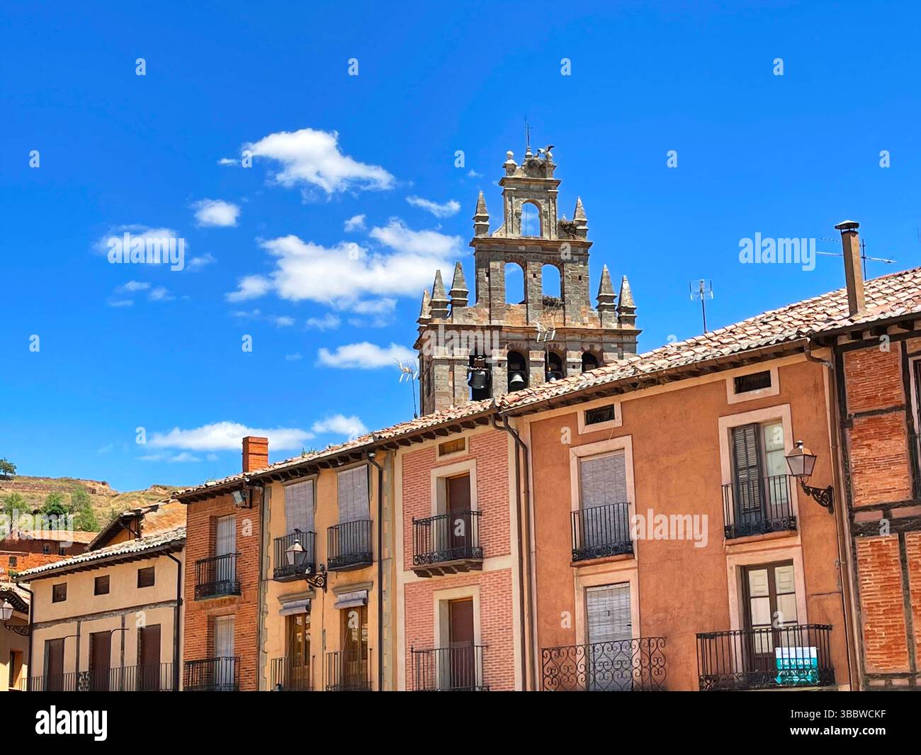 Houses and steeple of the church. Plaza Mayor, Ayllon, Segovia province, Castilla Leon, Spain. - Smartphone Captured Stock Image