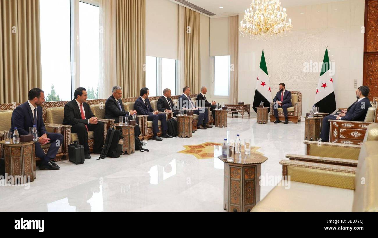 Syrian President Ahmad al-Sharaa receives a delegation of Kuwaiti businessmen and investors headed by Bader Nasser al-Kharafi Syrian President, Ahmad Al-Sharaa, receives a delegation of Kuwaiti businessmen and investors headed by, Bader Nasser Al-Kharaf,i at the People s Palace in Damascus, Syria, on May 16. Photo by Syrian Arab News Agency SANA  apaimages Syria Syria Syrian Arab Republic 160525 Syria SPO 002 Copyright: xapaimagesxSyrianxArabxNewsxAgencyx SANA xxapaimagesx Stock Photo