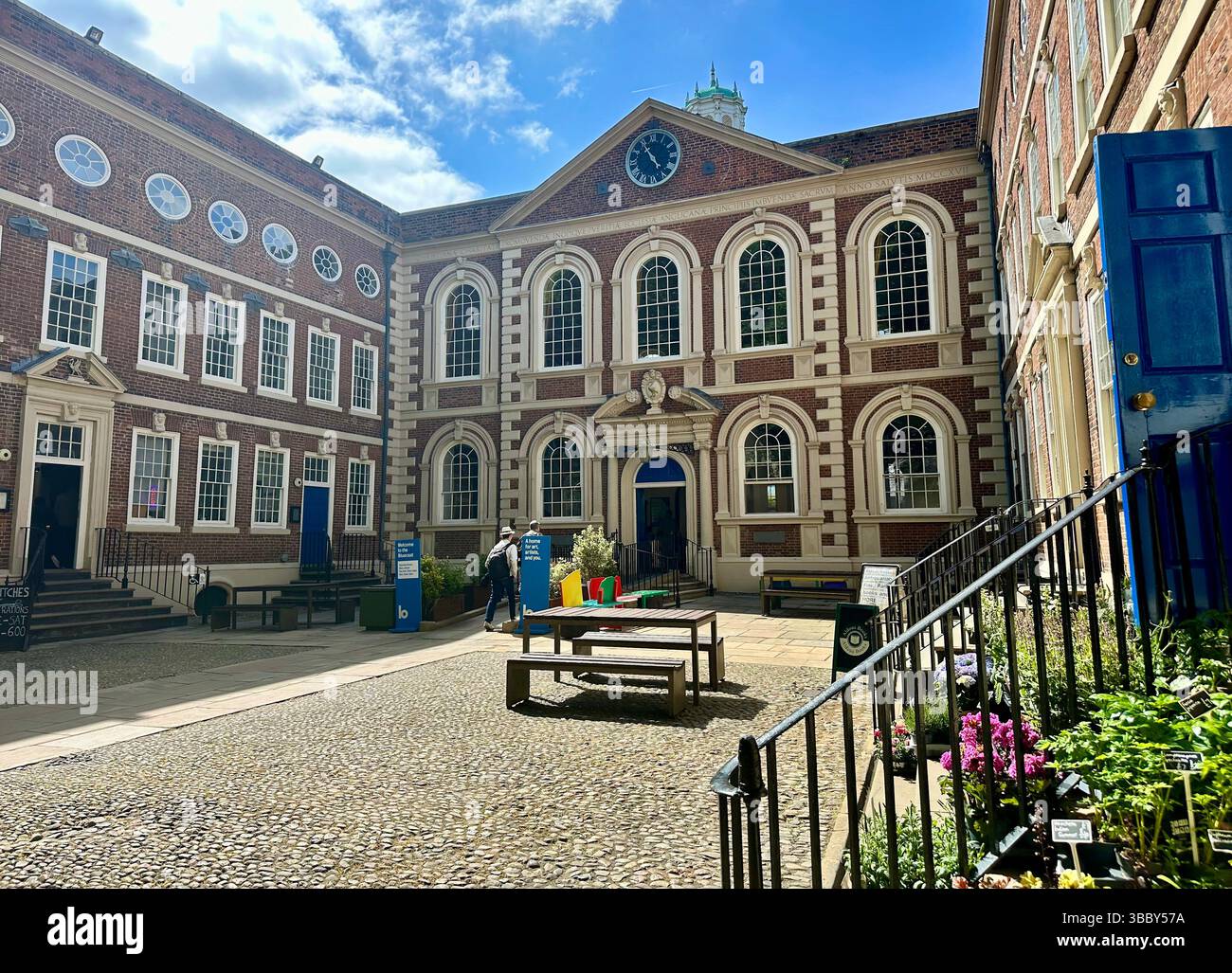 Bluecoat arts centre in Liverpool on a sunny day, viewed across the courtyard with clear blue sky. Taken 17 May 2025. Editorial use only. - Smartphone Captured Stock Image