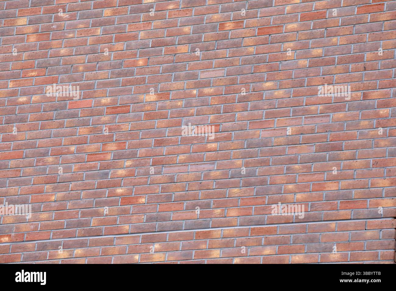 a brick wall built using stretcher / running bond Stock Photo