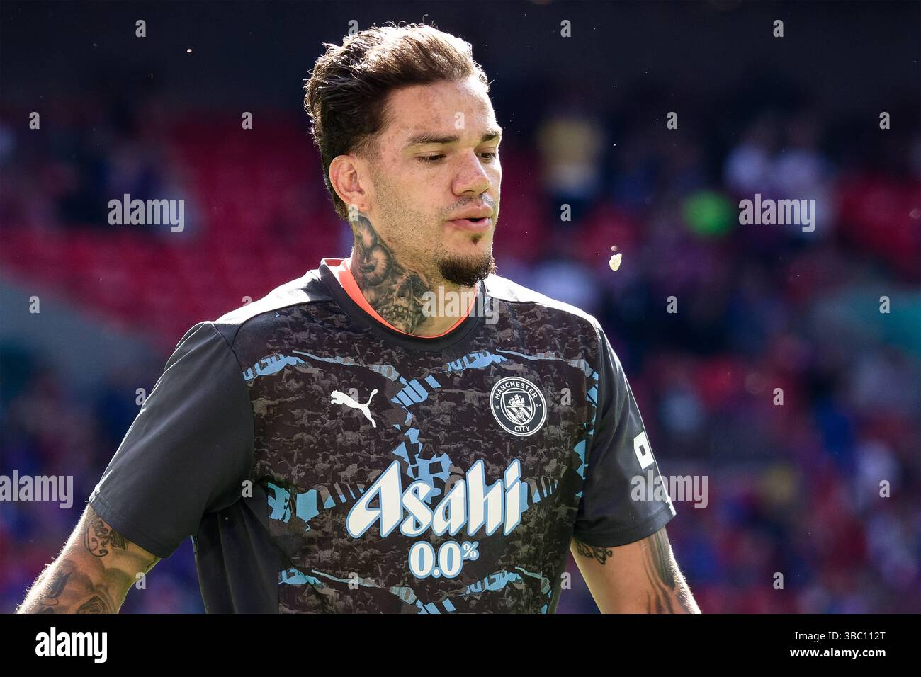 London, England, May 18 2025: Ederson (31 Manchester City) warming up ...