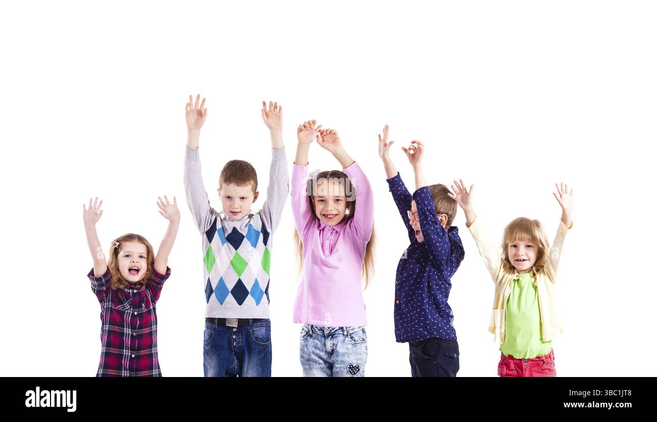 Happy children with raised hands isolated on white Stock Photo - Alamy