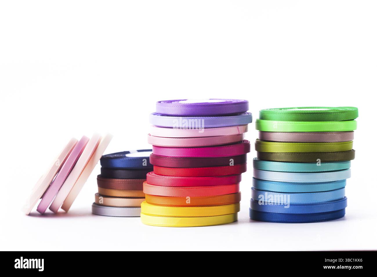 Multi Ribbon Bobbin Various colors ribbon bobbins isolated on white Stock Photo - Alamy