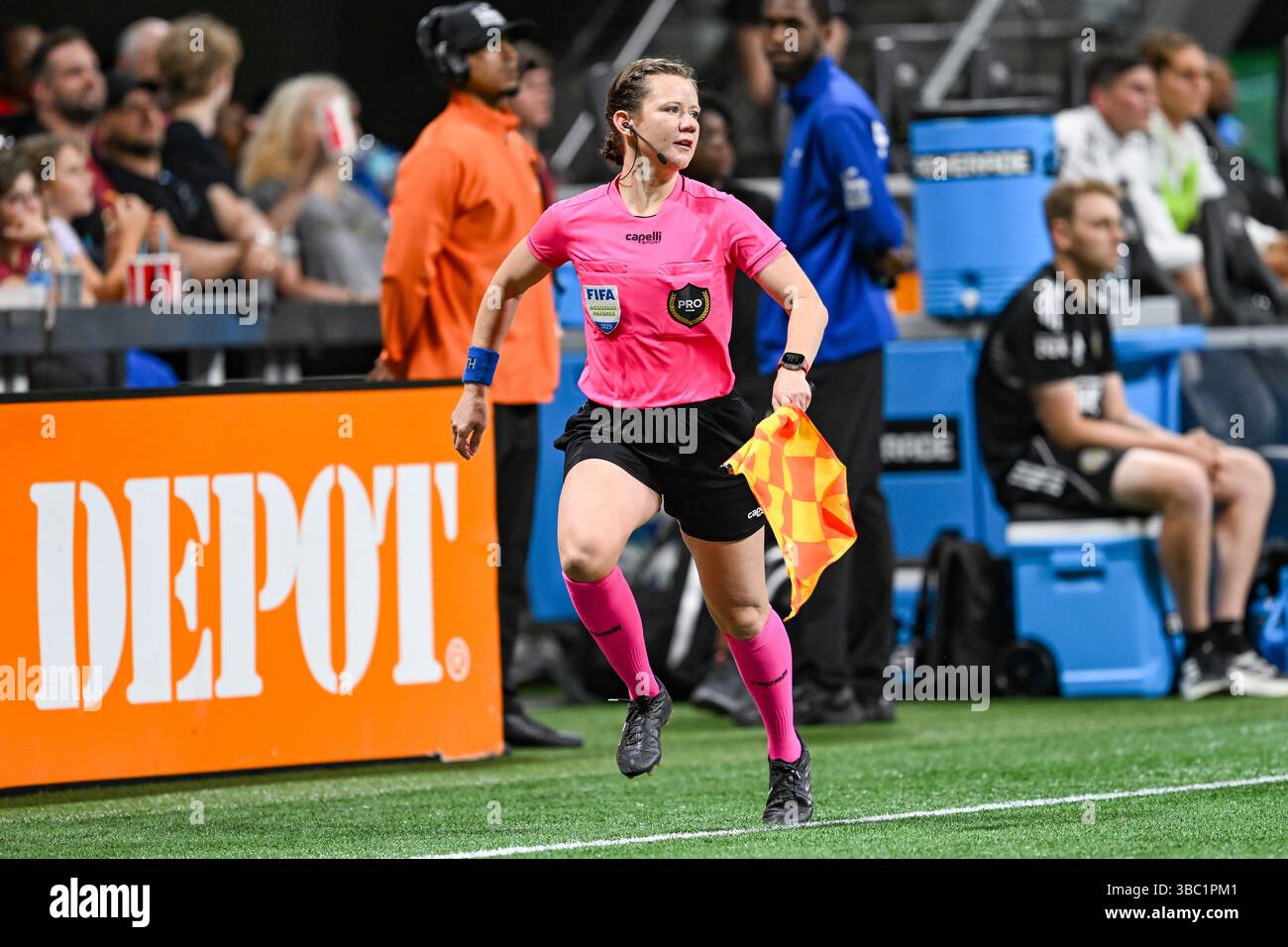 ATLANTA, GA – MAY 17: Assistant referee Kali Smith on the sideline ...