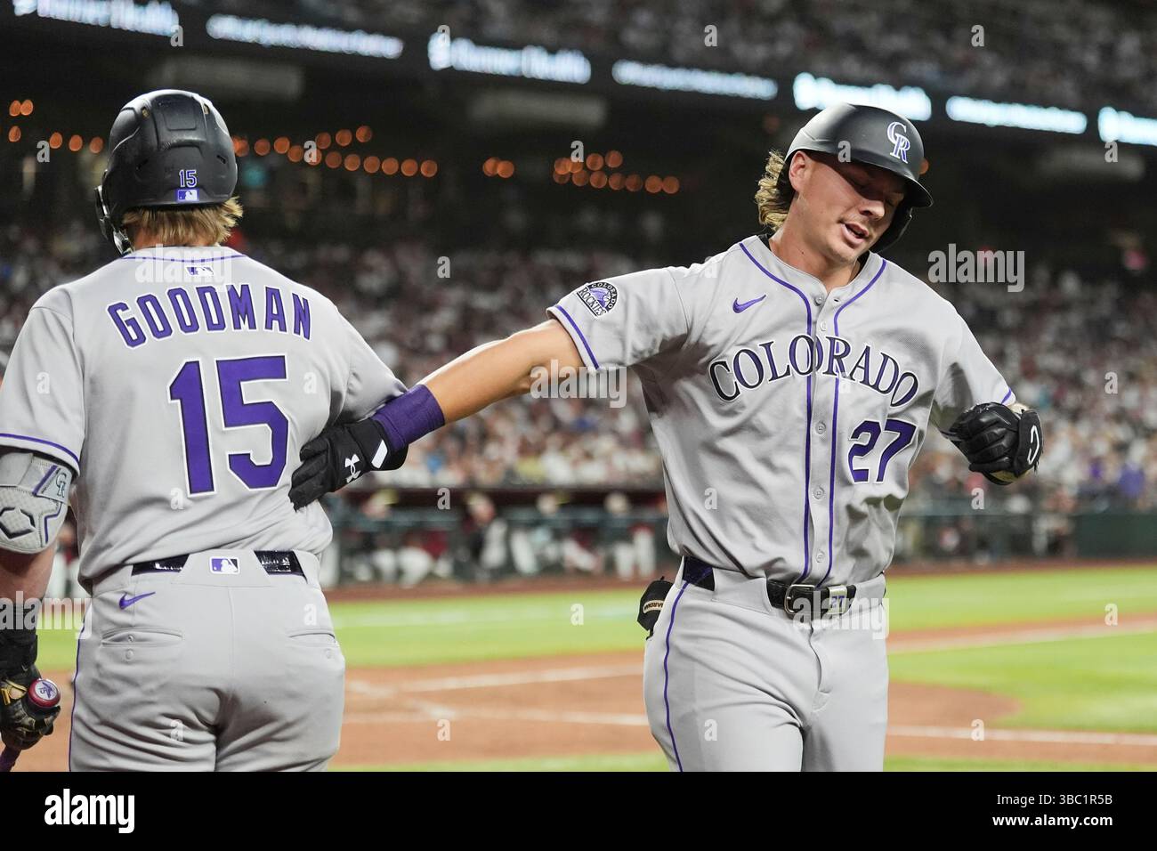 Colorado Rockies' Jordan Beck (27) celebrates his two-run home run ...
