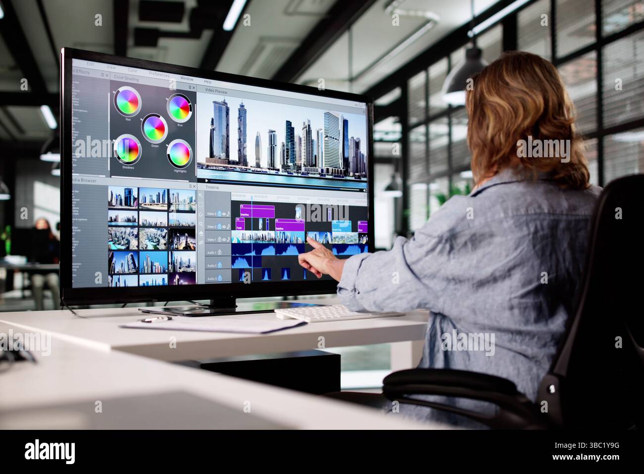 Creative Woman Edits Video Production And PC Picture Using Computer. Stock Photo