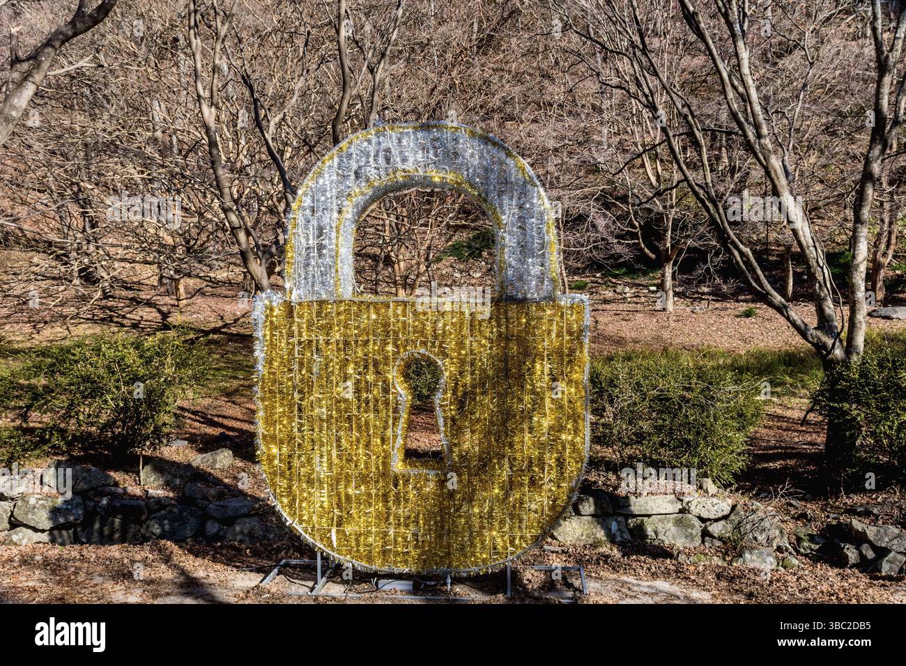 Sunchang-gun, South Korea. December 8, 2020: Padlock made of shinny Christmas stencil at Naejangsa National Park Stock Photo