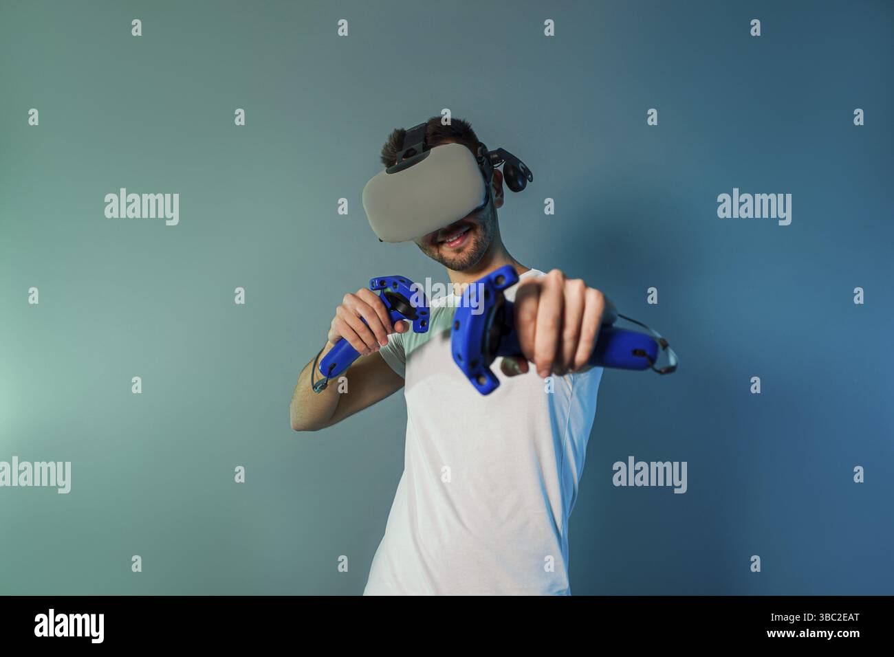 Man using a gaming gadget for virtual reality. Augmented reality in gaming Stock Photo