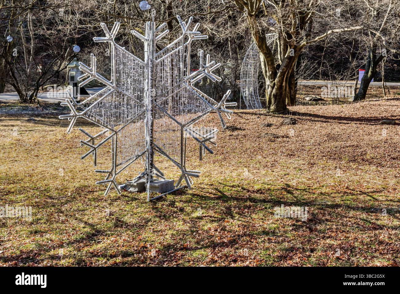 Sunchang-gun, South Korea. December 8, 2020: Winter snowflake of wire and lights in lawn at Naejangsa National Park Stock Photo