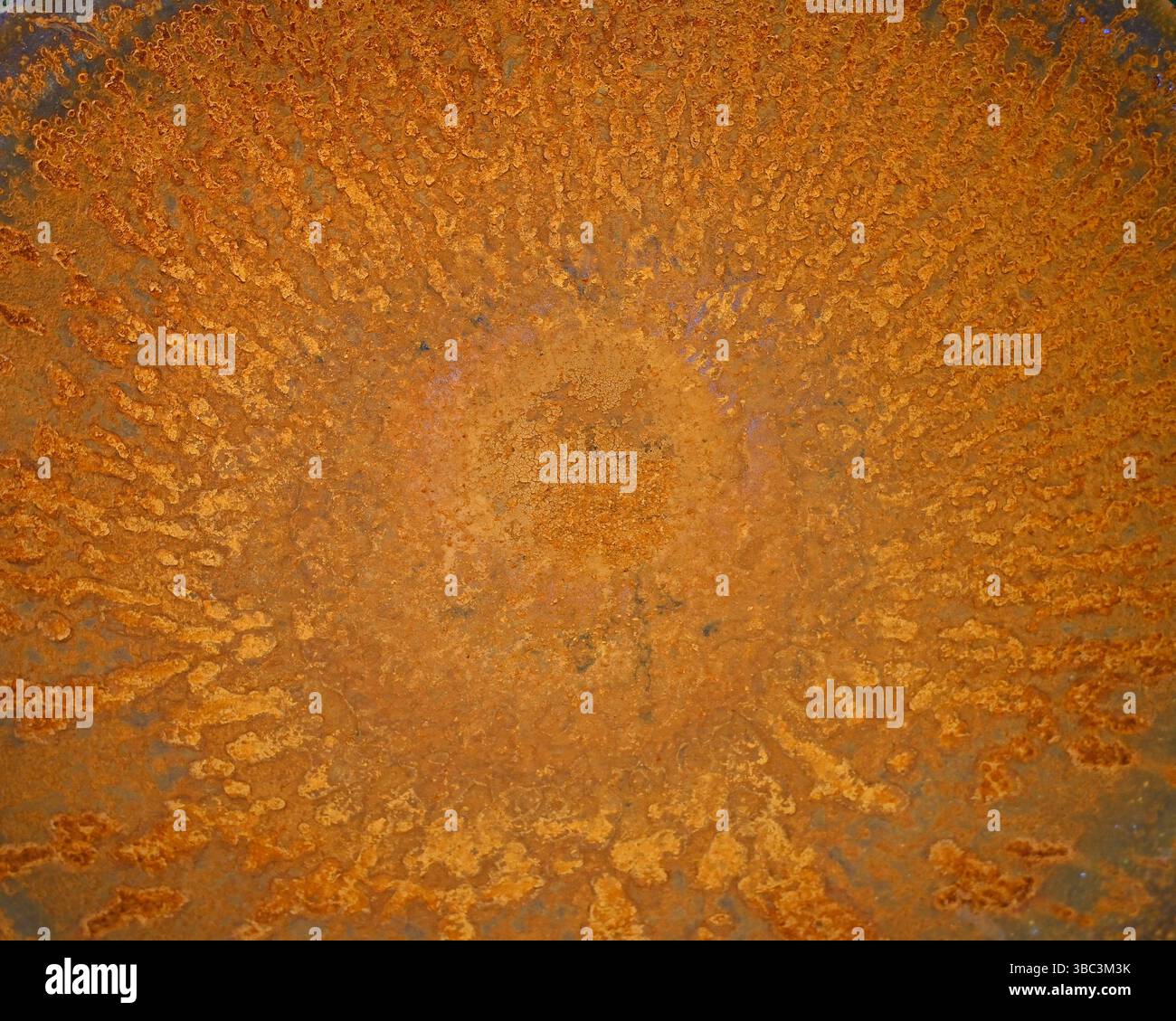 orange rusty metal bowl Stock Photo