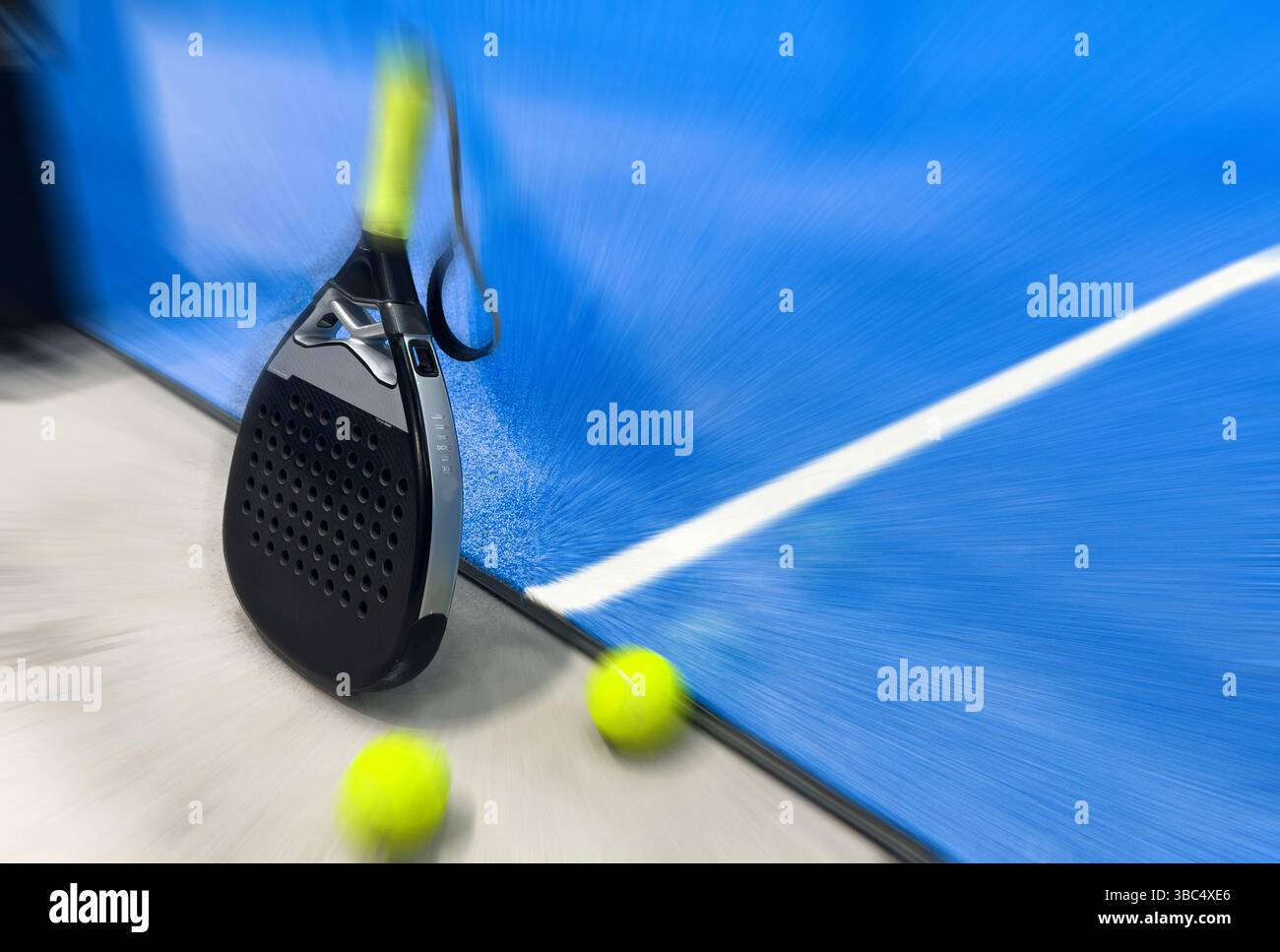 Padel Racket Photo Blue Court padel racket on a padel blue court with a ball Stock Photo - Alamy