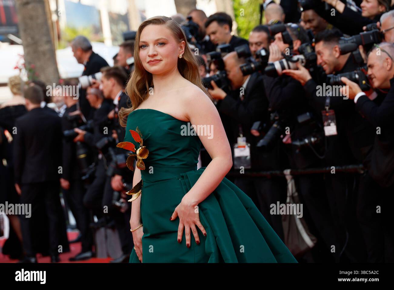 Mia Threapleton poses for photographers upon arrival at the premiere of