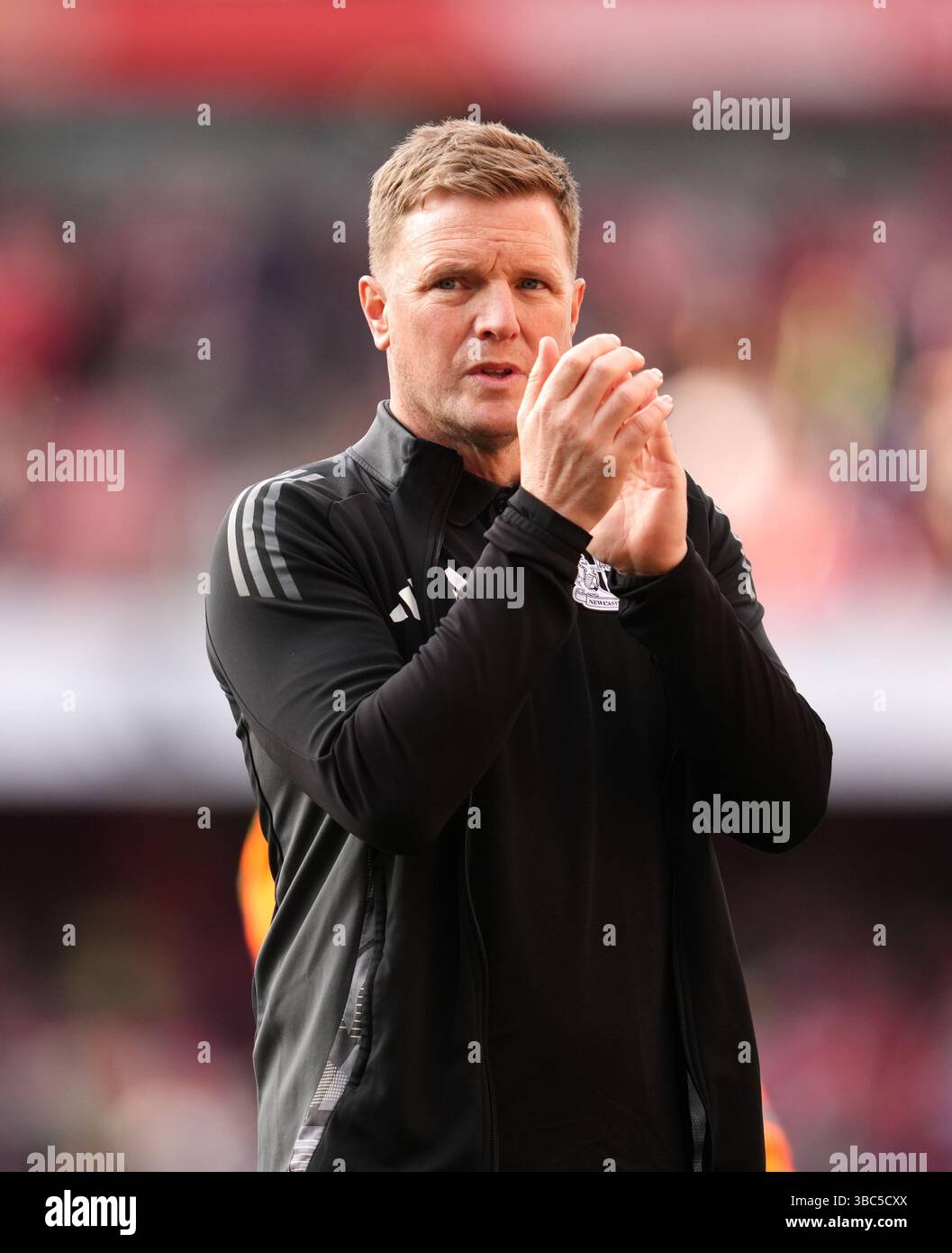 Newcastle United manager Eddie Howe applauds the fans following the ...