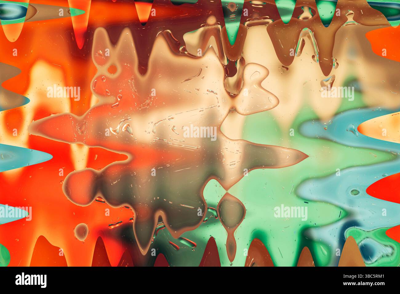 Colorful abstract liquid pattern, daytime, straight-on angle Stock Photo