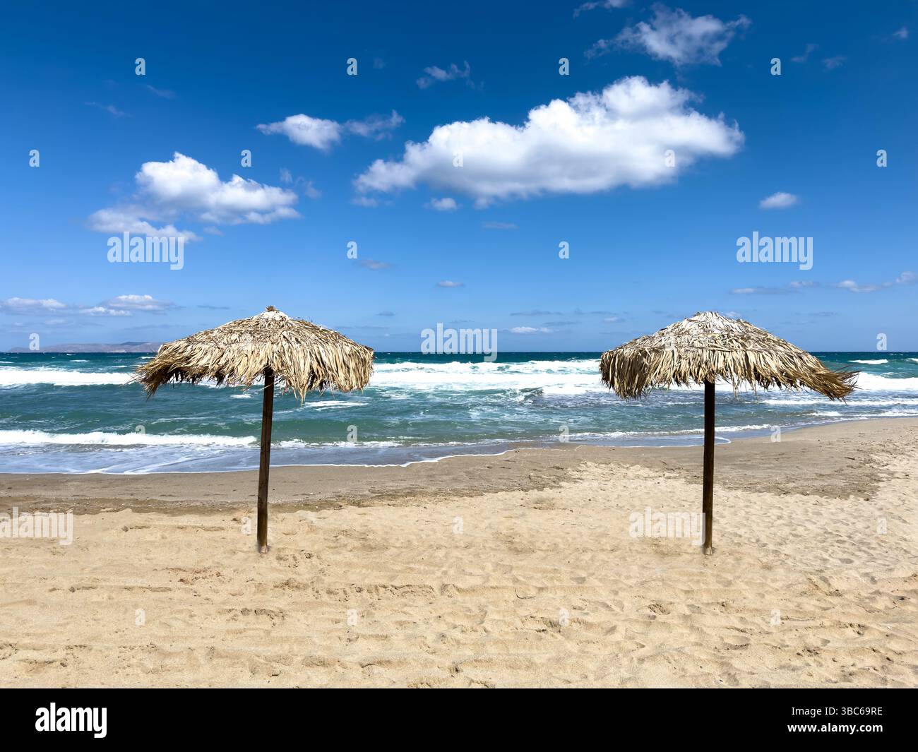 Straw parasols on the beach - Smartphone Captured Stock Image