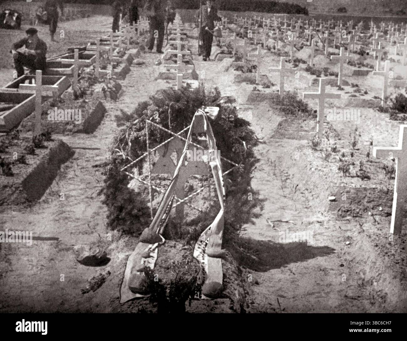 A 1945 photo by the 9th United States Army Air Force, 6th TAC Tactical Air Command showing the burial of the dead from the 'Gardelegen massacre.' Stock Photo