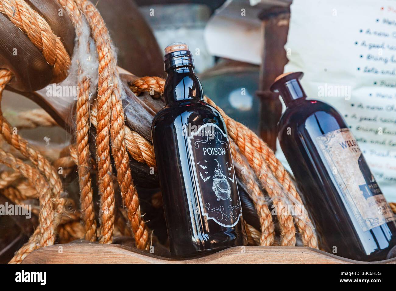 Closed bottles with various poisons, close-up. Stock Photo