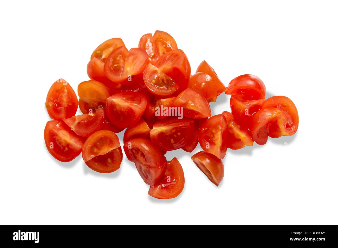 Sliced ripe cherry tomatoes isolated on white with clipping path includes Stock Photo