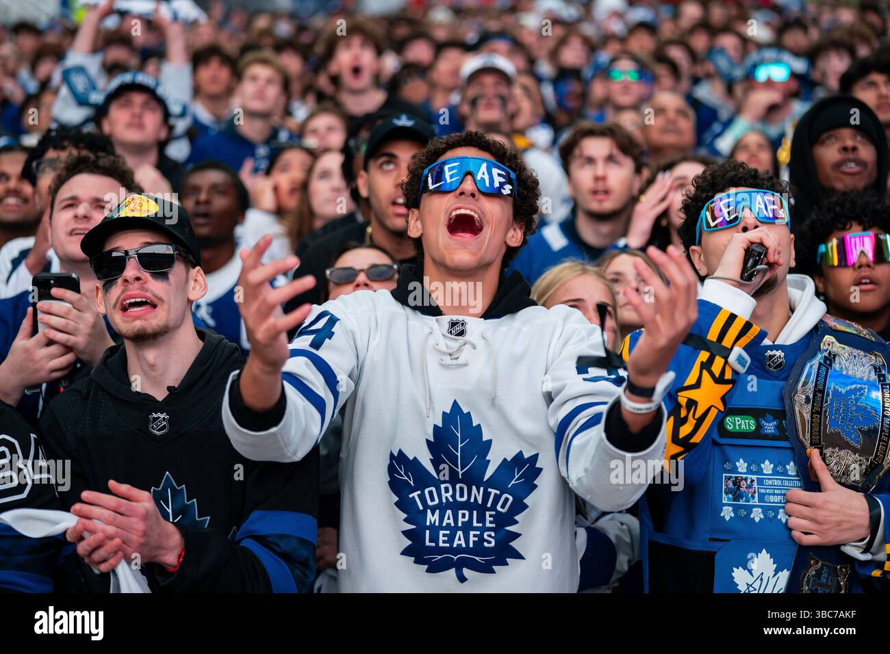 Fans react as they watch the Toronto Maple Leafs play the Florida ...