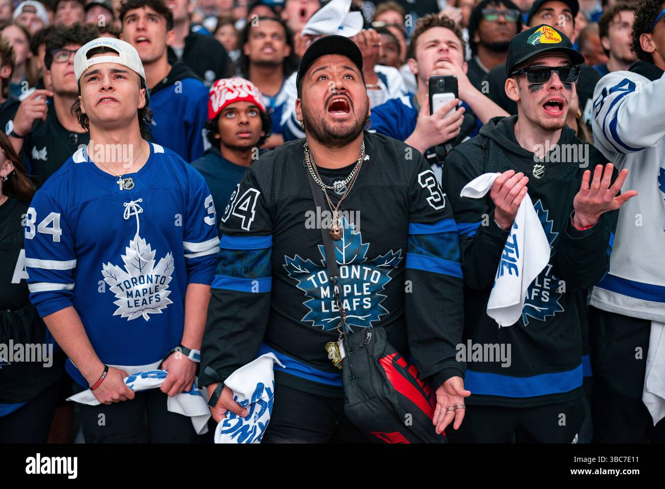 Fans react as they watch the Toronto Maple Leafs play the Florida ...