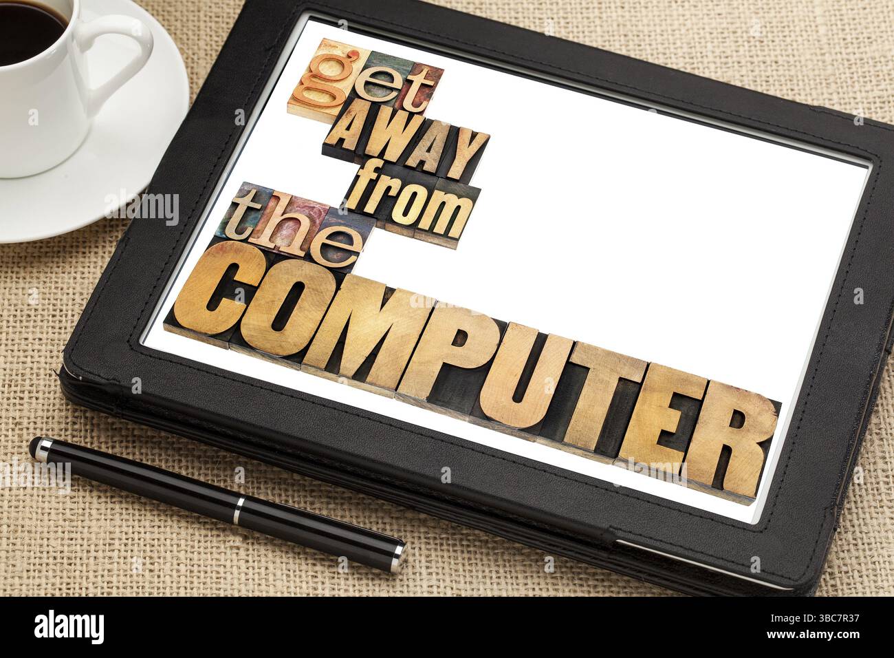 Get away from the computer - computer or internet addiction or work overload concept - isolated text in vintage letterpress wood type printing blocks Stock Photo