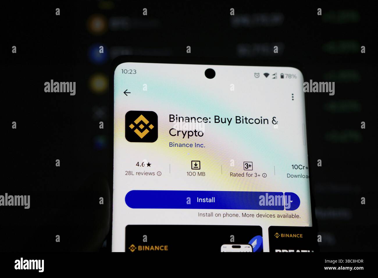 Binance app download screen on Play Store Stock Photo - Alamy