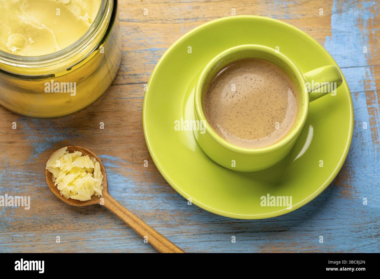 Cup of fresh fatty coffee with ghee (clarified butter) - ketogenic diet ...