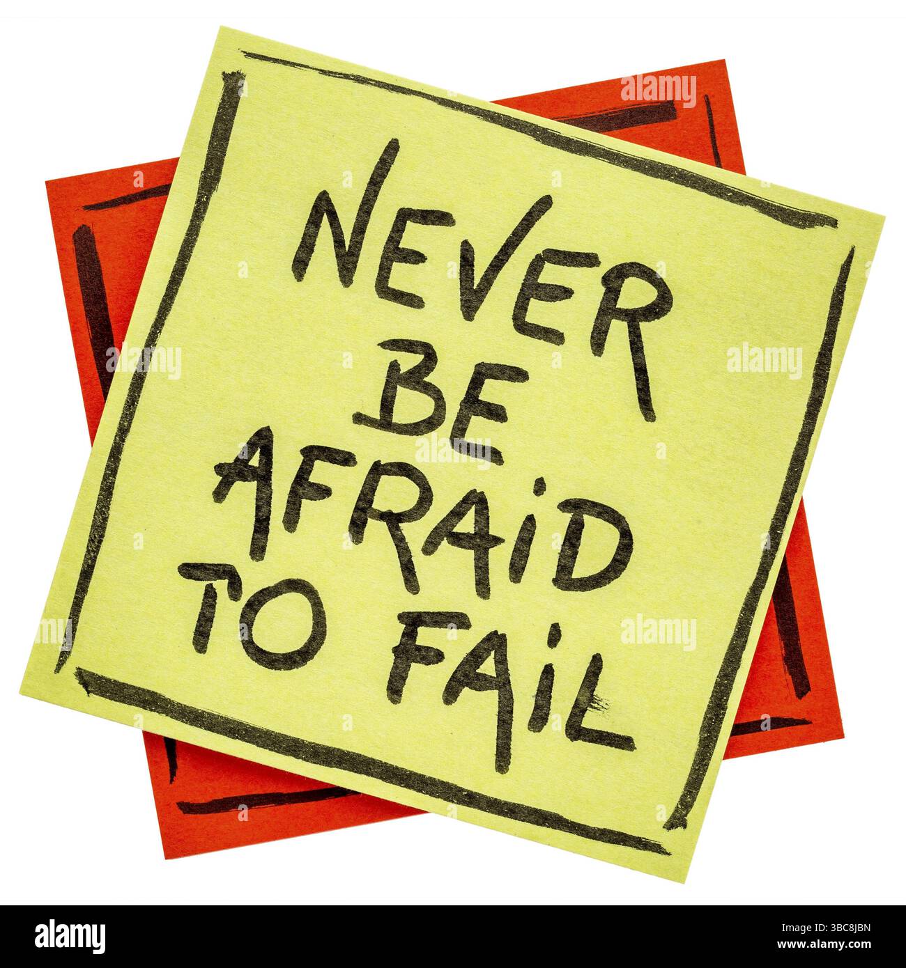 Never be afraid to fail reminder - handwriting on an isolated sticky ...