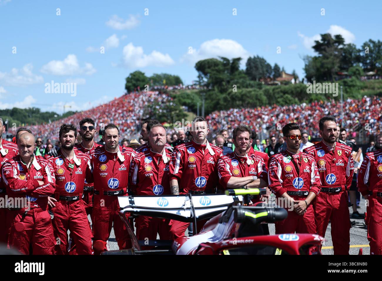 Imola, Italy. 18th May, 2025. Pit crew of Ferrari's Lewis Hamilton of Britain prepares before the Formula One Emilia Romagna Grand Prix at the Autodromo Internazionale Enzo e Dino Ferrari race track in Imola, Italy, May 18, 2025. Credit: Li Jing/Xinhua/Alamy Live News Stock Photo