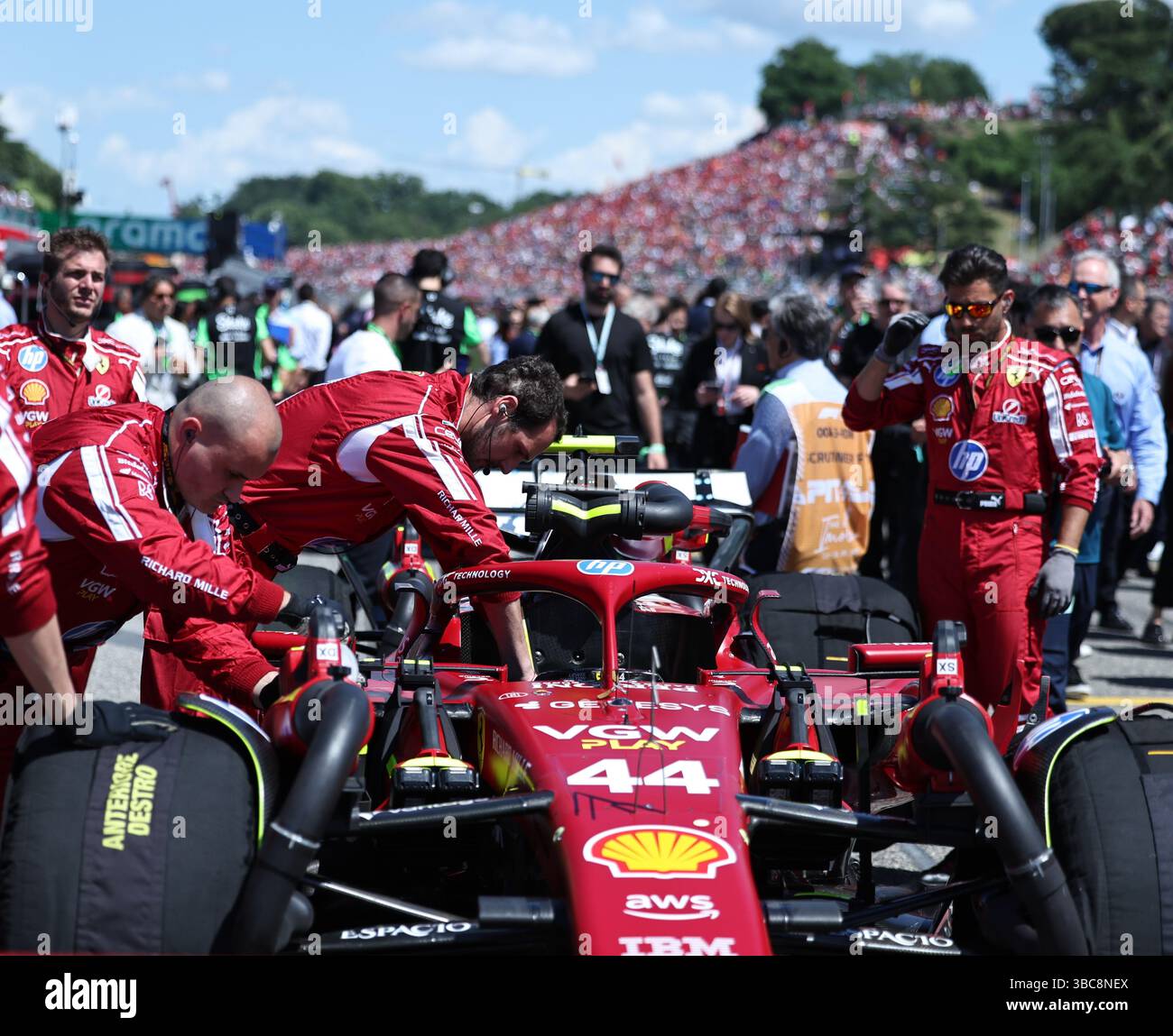 Imola, Italy. 18th May, 2025. Pit crew of Ferrari's Lewis Hamilton of Britain prepares before the Formula One Emilia Romagna Grand Prix at the Autodromo Internazionale Enzo e Dino Ferrari race track in Imola, Italy, May 18, 2025. Credit: Li Jing/Xinhua/Alamy Live News Stock Photo