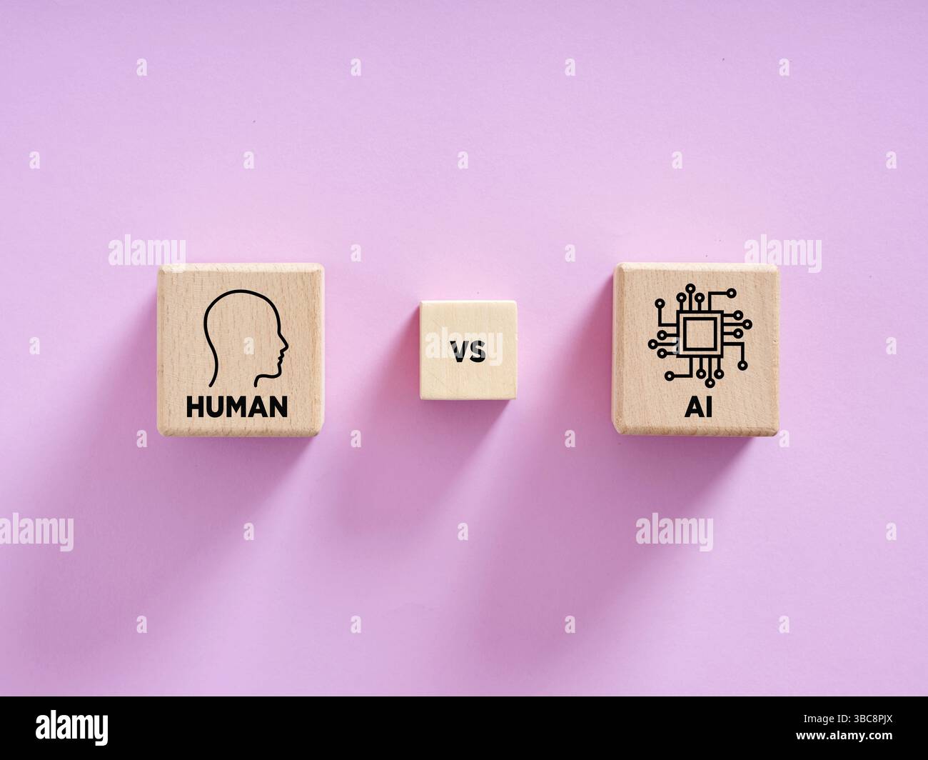 Wooden cubes representing human and artificial intelligence confronting each other symbolizing technological challenge Stock Photo