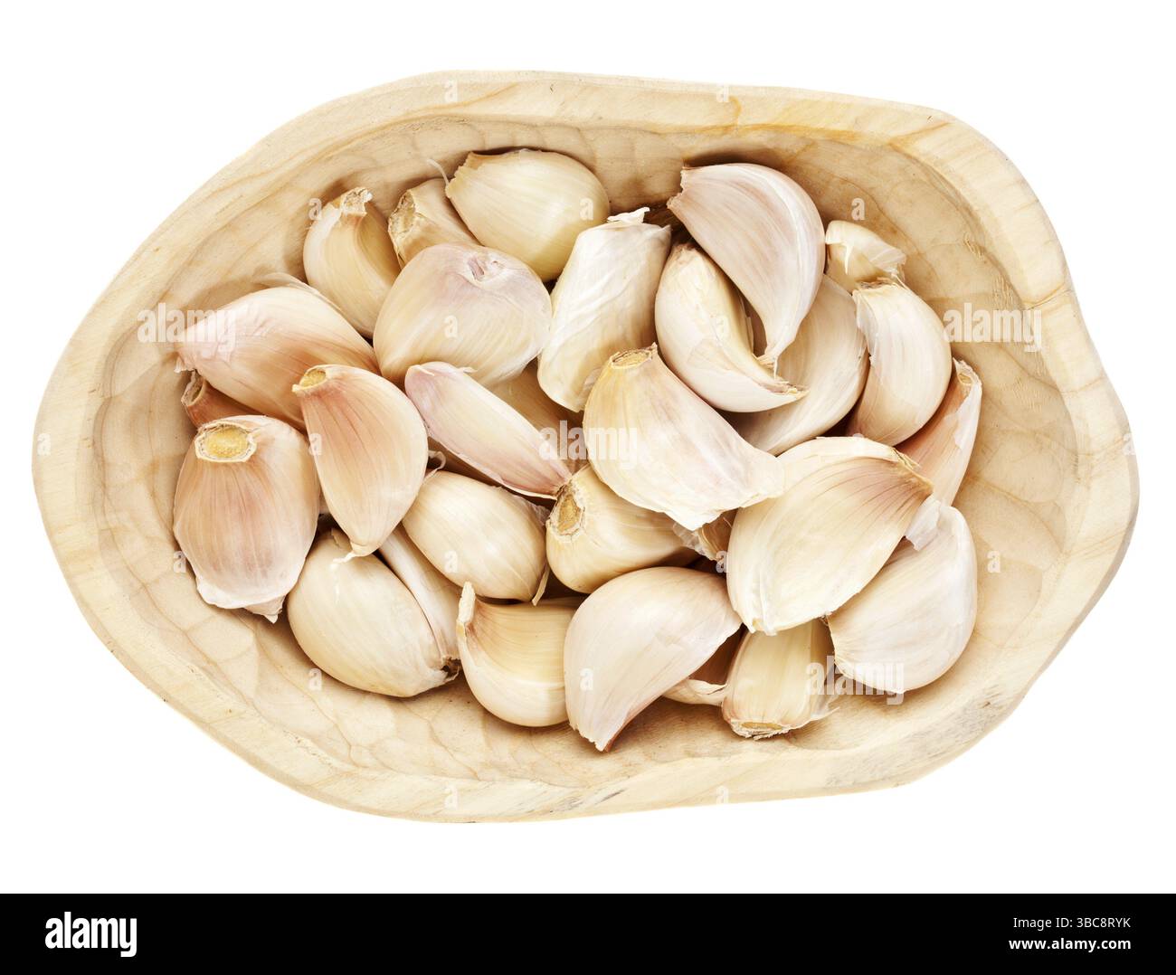 Garlic cloves in a rustic wood bowl isolated on white Stock Photo - Alamy