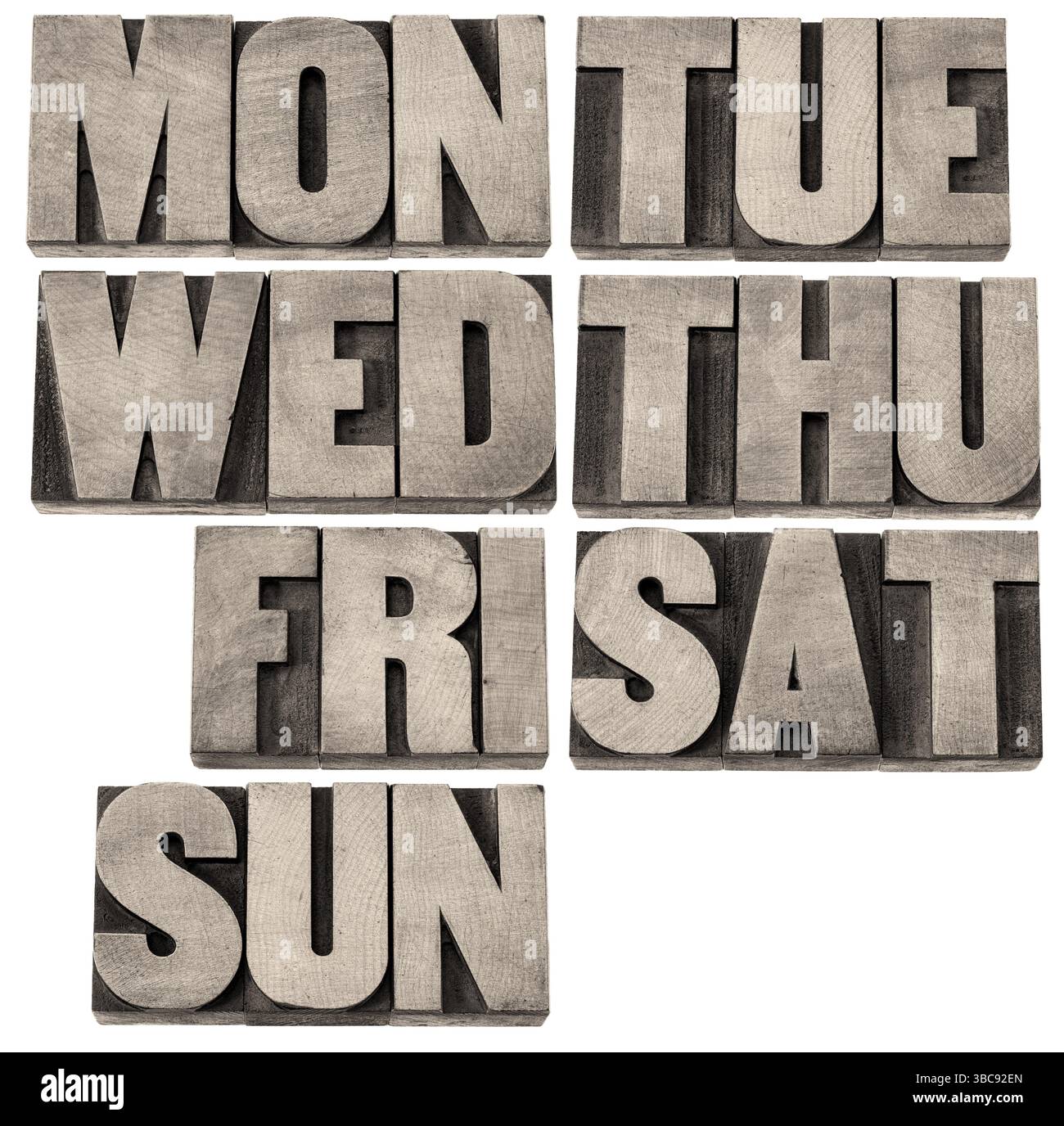 7 days of week (first 3 letter symbols) in isolated vintage wood ...