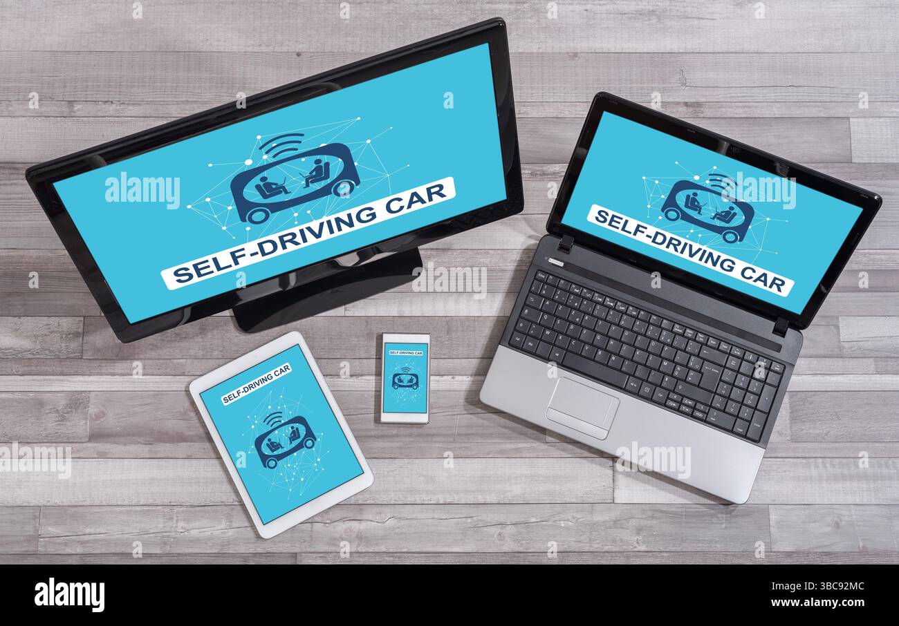 Self-driving car concept shown on different information technology devices Stock Photo