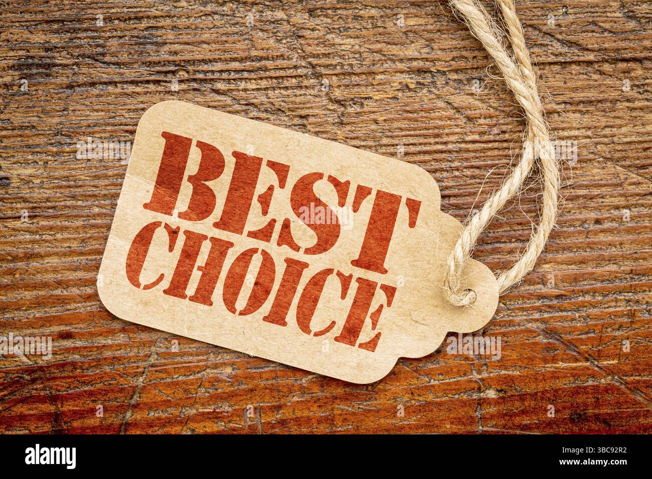 Best choice sign a paper price tag against rustic red painted barn wood ...