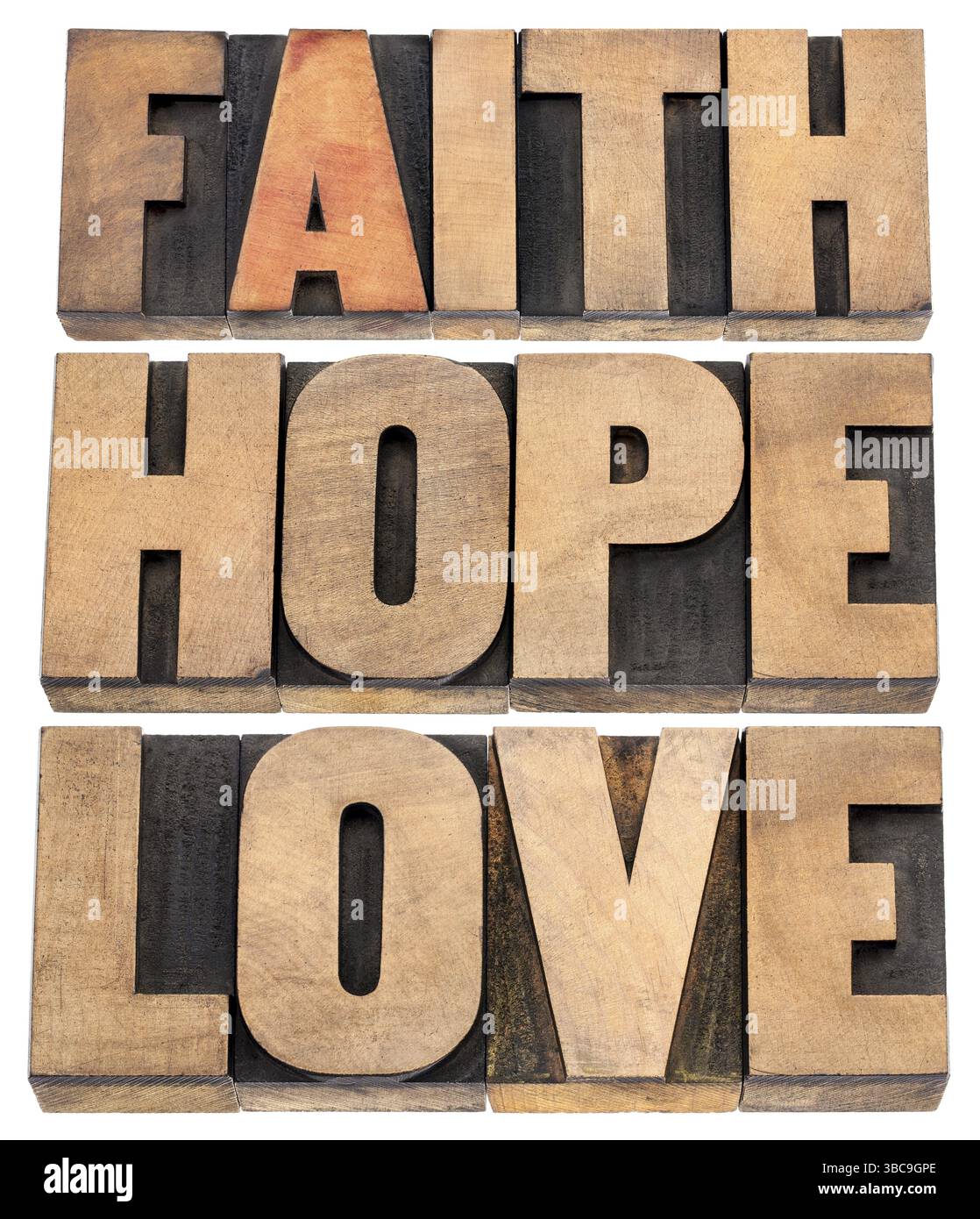 Faith, hope and love - a collage of isolated words in vintage letterpress wood type Stock Photo