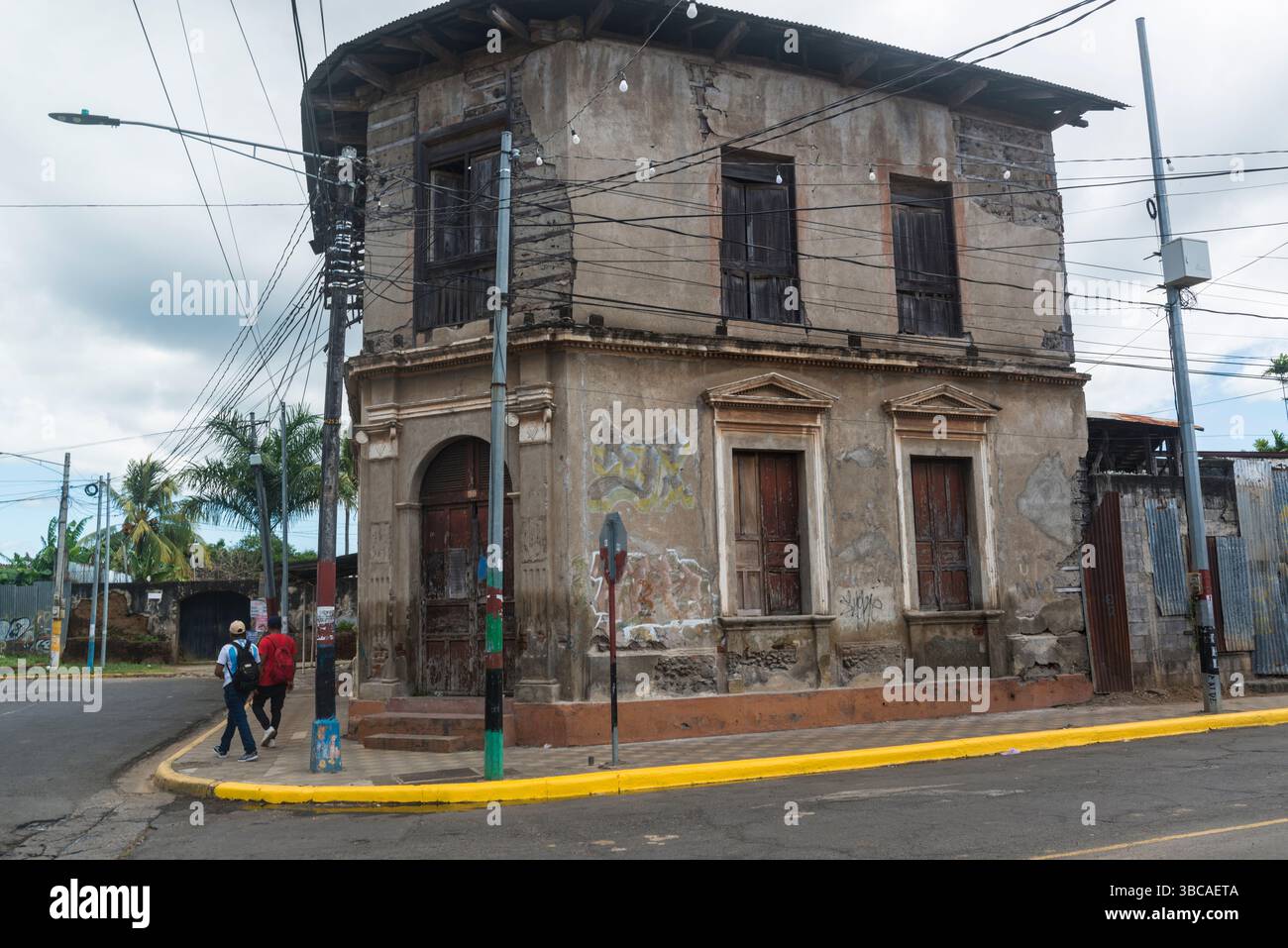 Dilapidated house on a street corner in Masaya, Nicaragua. Stock Photo
